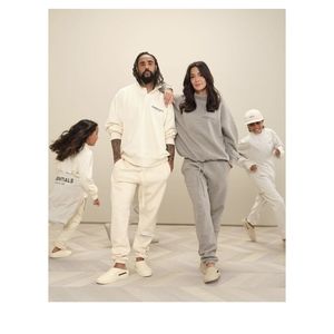 Fear of God Essentials AUTHENTIC BUTTERCREAM Colored Sweat Pants medium PacSun